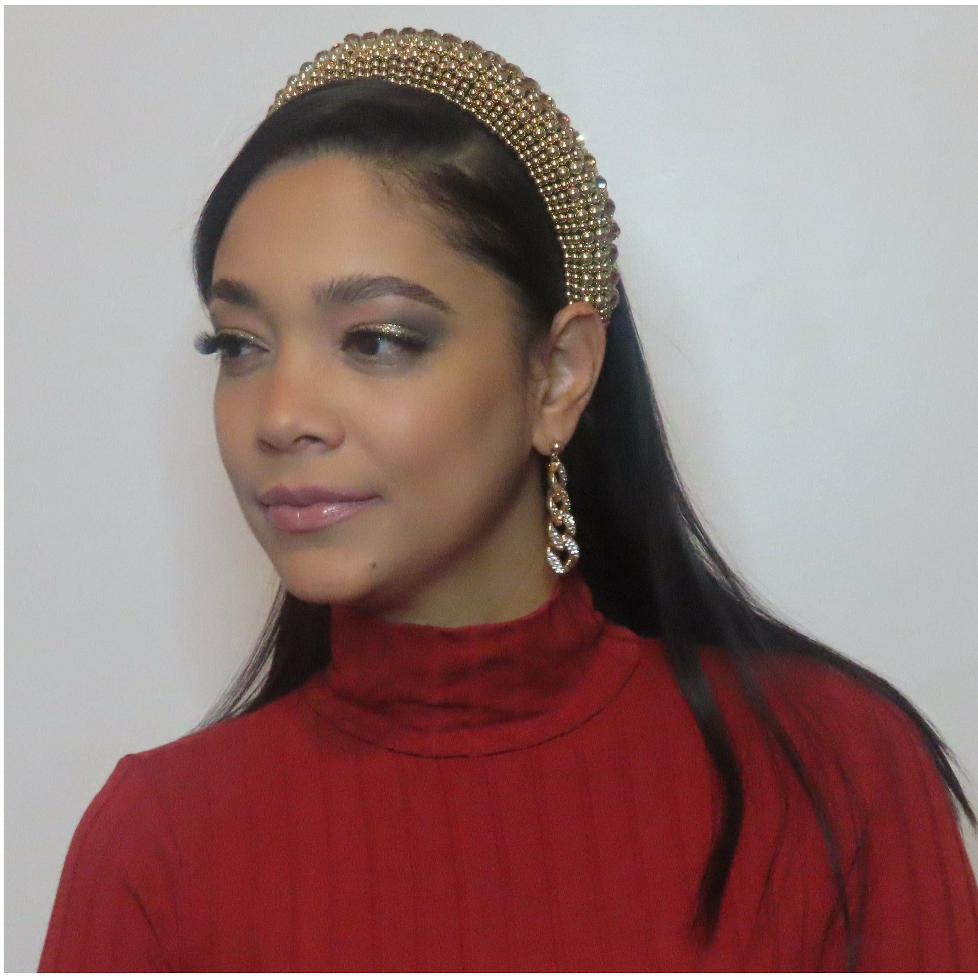 women wearing the rhinestones crown headband in gold color