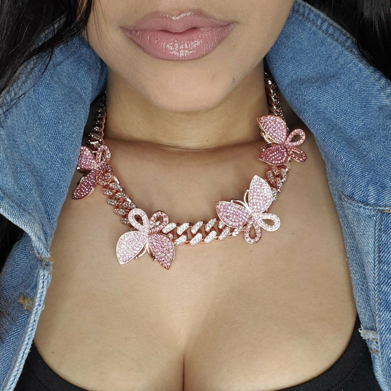 butterfly cuban link necklace. butterfly is 13mm. cubic zirconia gems. rose gold plated over rhodium 